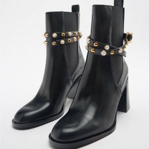 Zara black boots with accents